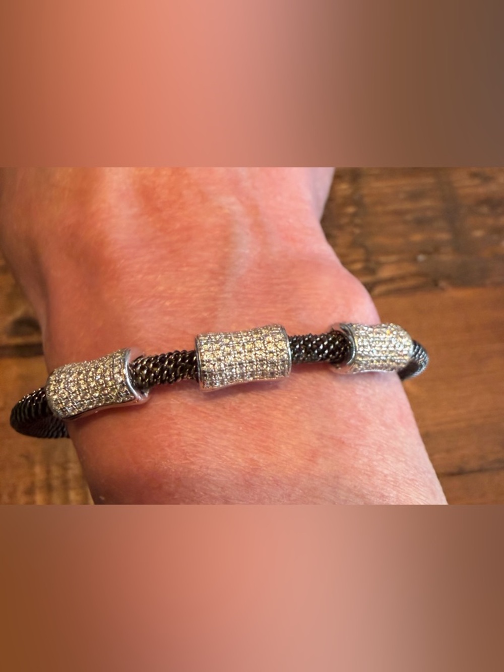 Unique sterling silver (925)  bracelet with 3  rows of diamonds .